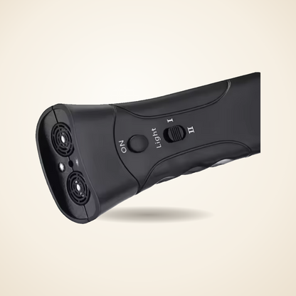 Close-up of the Caelova bark deterrent's dual ultrasonic speakers and LED light